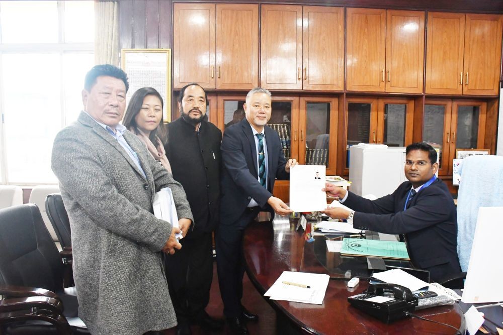 Dr. Chumben Murry, NDPP candidate, accompanied by Deputy Chief Minister Yanthungo Patton, Advisor Hekani Jakhalu Kense and other dignitaries, filing his nomination papers for Lok Sabha Election 2024 before Commissioner Nagaland & Returning Officer, Sushil Kumar Patel at Commissioner & Returning Officer Office, Kohima on March 26. (DIPR Photo)